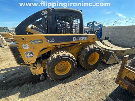 old john deere skid steer|john deere 320 skid steer for sale.